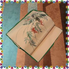 【名古屋帯】縮緬地薄ピンク色に南天柄の塩瀬帯