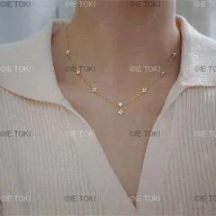 ラッキーな四つ葉のクローバーネックレス 長い色の骨のチェーン 冷たい風 気質のタッセル パーティーファッション