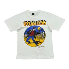 3067古着90sオーガスタRAWHIDE KIDコミックアートリンガーTシャツ 