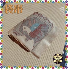【袋帯】練色紬地鳥柄更紗模様の帯