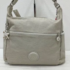 4759　良品　Kipling キプリング　タグ付き ショルダーバッグ　クロスボディ　肩がけ　斜めがけ　モンキーチャーム　ゴリラ　ベージュ系　ライトベージュ系　総柄　Dots Cream