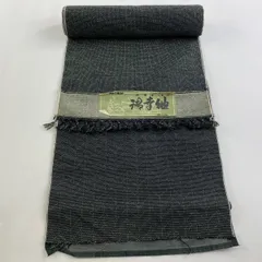 反物 秀品 紬 幾何学模様 茶緑色 正絹 【中古】