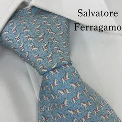 《美品》Salvatore Ferragamo (サルヴァトーレ・フェラガモ) イタリー製シルクネクタイ 総柄 アニマル柄 馬 水色