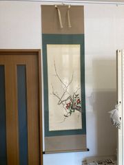 梅椿に鶯