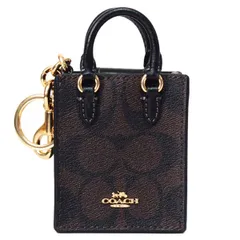 新品coach ミニ サドル バッグ チャーム シグネチャー - メルカリ