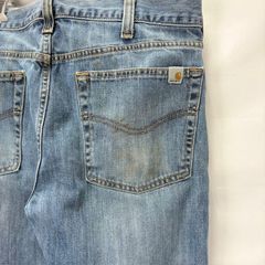 Carhartt relaxed straight denim bottoms jeans, size 33x34, item number 07060813 01, stained.