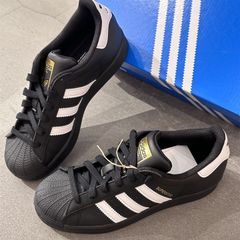 Adidas originals Superstar ブラックゴールドです男女兼用フラットシューズ