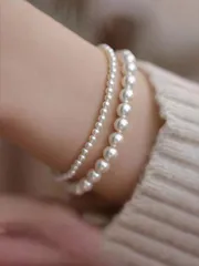ジュエリー レディース ブレスレット セット 2個セット フェイクパール ビーズブレスレット 上品なボヘミアンスタイルアクセサリー 女の子/レディースへのギフト 伸縮性のあるバングル 様々なシーンで着用可能