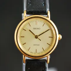 244 【美品　新品電池】　SEIKO セイコー AVENUE アベニュー 腕時計 レディース クォーツ式 ゴールド ゴールド文字盤 ラウンド 1F21-0C40