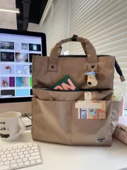 **2025年夏季新作 大容量ナイロン製バックパック カーキカラー ダブルショルダーストラップ 通勤・学生用 多機能デザイン**